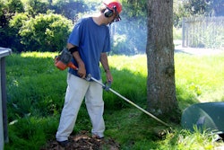 Man weedeating 59c98b32ce416