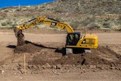 Caterpillar 320 digging a foundation.