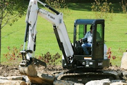 A Bobcat E42 compact excavator makes for easy work of a retaining wall.