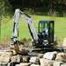 A Bobcat E42 compact excavator makes for easy work of a retaining wall.
