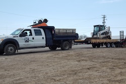 Construction crews take advantage of extra room provided by cab overhang and deck-over trailers.