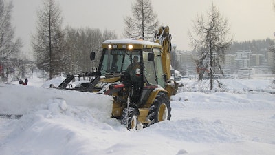 Backhoe Plowing Snow Jyväskylä