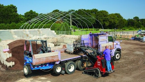 Toro’s TXL 2000 features a unique telescoping arm. When fully telescoped and raised, it can reach 123 inches high—plenty of clearance to dump materials over a standard dump truck.