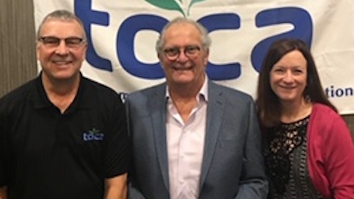 TOCA Executive Director Den Gardner (left) and Project EverGreen Executive Director Cindy Code (right) present Norman Goldenberg with the 2019 Environmental Communicator Award.