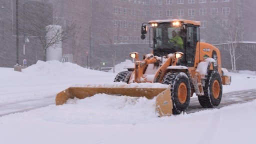 Leighton A. White, Inc., of Milford, N.H., uses a Hyundai HL940 wheel loader to plow the parking lots at Concord Hospital during a heavy snowstorm.