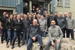 LMN team members pose for one last photo in front of their office for the last 5 years in Pickering, Ontario, Canada