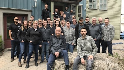 LMN team members pose for one last photo in front of their office for the last 5 years in Pickering, Ontario, Canada