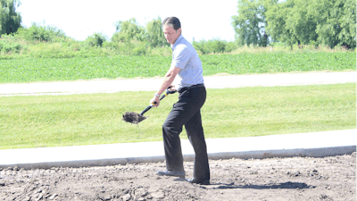 President and CEO Jason Andringa unearths the first shovel of dirt to officially begin the construction process on the new facilities.