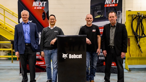 From left to right: Mike Ballweber, president Doosan Bobcat North America; Scott Park, CEO Doosan Bobcat; Mike Kiefer, site operations manager, Litchfield; Jim Flynn, vice president of operations, Doosan Bobcat North America.
