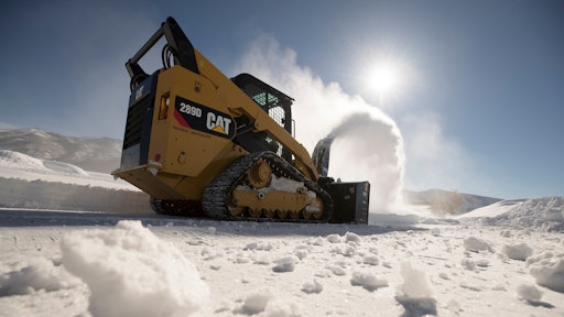 The appeal of either skid steers or compact track loaders for use in snow removal is understandable. Both machines have advantages and disadvantages in snow work. One benefit if the variety of attachments available, such as this Caterpillar 289D Compact Track Loader with SR321 Snow Blower.