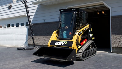 Many contractors use primarily mid-size compact track loaders, but there are big benefits to rounding out a fleet with the industry’s smallest sit-in track loaders. Here, a small sit-in compact track loader easily sits within a residential garage door.