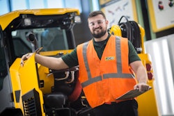 Devin Bass, JCB apprentice and Savannah Tech GOAL student award winner reviews a JCB skid steer during his rotation with the quality team.