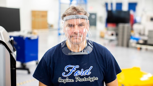 Dave Jacek, 3D printing technical, wears a prototype of a 3D-printed medical face shield printed at Ford’s Advanced Manufacturing Center. Ford Motor Company, joining forces with firms including 3M and GE Healthcare, is lending its manufacturing and engineering expertise to quickly expand production of urgently needed medical equipment and supplies for healthcare workers, first responders and patients fighting coronavirus.