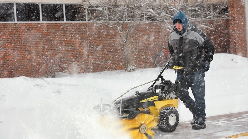 Man vs. Machine Keep Sidewalks Clear of Snow this Season Green