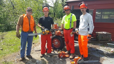 Some members of the Rotary Copperhead Chain Saw Team including James Tucker who is shown on the left. Tucker is a retired outdoor power equipment dealer from Fitzgerald, GA and a longtime Rotary customer. “James sharpened, tuned and repaired saws throughout the day to keep the team up and running. He was a tremendous asset,” noted Smith whose brother Daniel (far right) was a skid steer operator.
