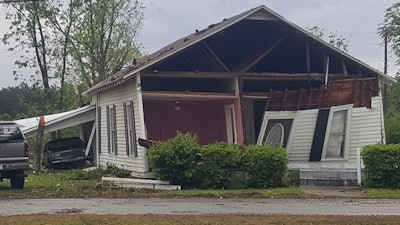 Several large pecan trees were cut and removed from the area. This family’s home was blown off its foundation and will require extensive work to become livable again.