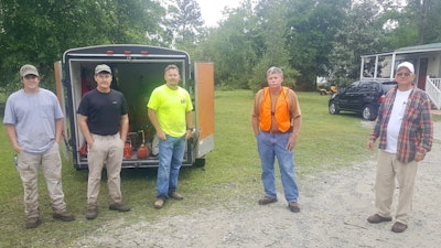 Members of the Rotary Copperhead Chain Saw Team.