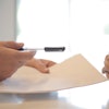 Crop Businessman Giving Contract To Woman To Sign 3760067