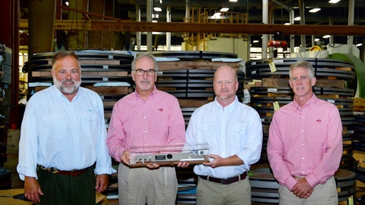 Rotary CEO Ed Nelson, Chief Manufacturing Officer Dennis Lamb, General Manager Tim Cooper and CFO Don Martin proudly display Rotary’s 250 millionth blade that was produced in early 2020.