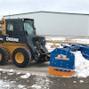 Box pushers work efficiently, both moving snow and containing it while it’s pushed to a designated location for collection.