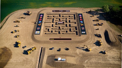 It took a Caterpillar 336 Next Gen Excavator 70 man-hours to dig the actual gameboard, utilizing 6,880 yards of cut dirt to dig the maze and berm for a total of 5,300 tons of earth. The inside height of the walls measure 4 ft. high with an overall gameboard size of 162.4 by 180.4 ft.