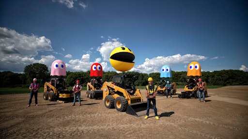 During the video, the five players race their machines around the exact 3D replica of the iconic PAC-MAN™ board to simulate gameplay of the original arcade game. The movement is all done through remote control operation far above the constructed maze, utilizing 236D3 Skid Steer loaders from The Cat Rental Store.