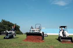Doosan Bobcat executives break ground with Bobcat equipment