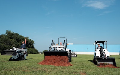 Doosan Bobcat executives break ground with Bobcat equipment