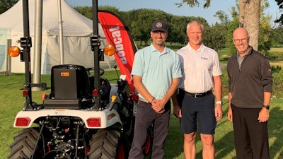From left Village Development Director David Newman; Doosan Bobcat President Mike Ballweber and Open Tournament Director Mark Johnson.