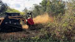Randy R. Mitchem, Inc. is using a Fecon BLACKHAWK mulcher head such as the one shown to complete a variety of land clearing projects.