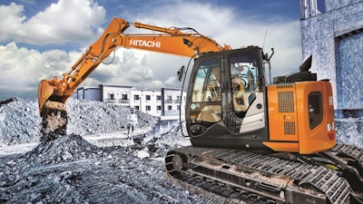 Hitachi Construction Machinery's parent company is selling half its shares in the business.