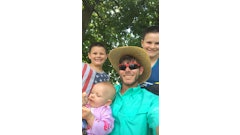 Darren Johnson, owner of Long Term Lawn Care, with his three children.