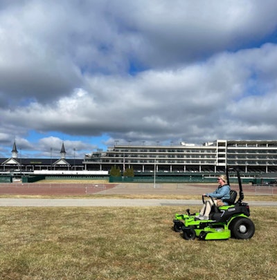 Green Industry Pros Editor Sarah Webb tries her hand at Greenworks Commercial's OptimusZ battery-powered mower at Churchill Downs at day before Equip Expo.