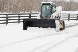 A snow pusher with an ignite attachment.