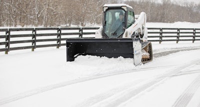 A snow pusher with an ignite attachment.