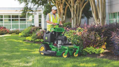 Stand-on mowers allow landscape pros to cut around nonlinear turf areas.
