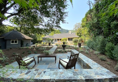 A client's backyard oasis after a landscape designer created the concept using software and the team installed it.