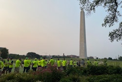 Green industry professionals prepare to tackle projects near the base of the Washington Monument for NALP's Renewal & Remembrance event.