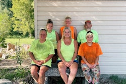 Shelly Fjelstad (front, middle) and other members of Creative Landscaping's staff.