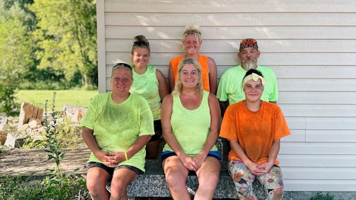 Shelly Fjelstad (front, middle) and other members of Creative Landscaping's staff.