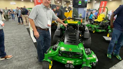 Carl Agee shows off John Deere's new QuikTrak Stand-On Mower.