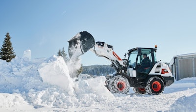 Bucket attachments can be added to compact equipment to help contractors perform snow and ice management services.