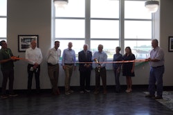 Albaugh dedicated a mural spanning the historic Stockyards Expressway as a gift to the city of St. Joseph, Mo.