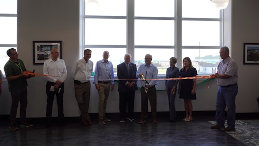 Albaugh dedicated a mural spanning the historic Stockyards Expressway as a gift to the city of St. Joseph, Mo.