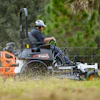 Engineered for high-demand commercial work, the Bobcat ZT7000 zero-turn mower pairs a heavy-duty drive system, advanced cutting technology with engine options suited for long lawn-mowing days.
