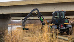 A landscaper using a DM360 for roadside maintenance.