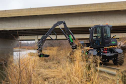 A landscaper using a DM360 for roadside maintenance.