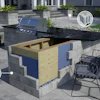 Modern outdoor kitchen with built-in blue grill, black countertop, wooden cabinetry, and black chairs on patio