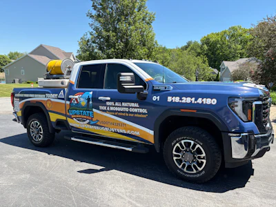 A Hannay hose reel mounted on the truck for Upstate Bug Busters.