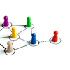 Colorful game pieces connected by lines representing a network or organizational structure diagram